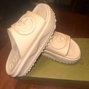 Gucci slides. Worn twice. Light scuff on top of right slides. Good condition